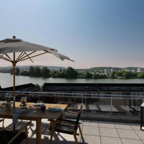 Direkter Rheinblick von Dachterrasse Seniorenwohnen am Rhein